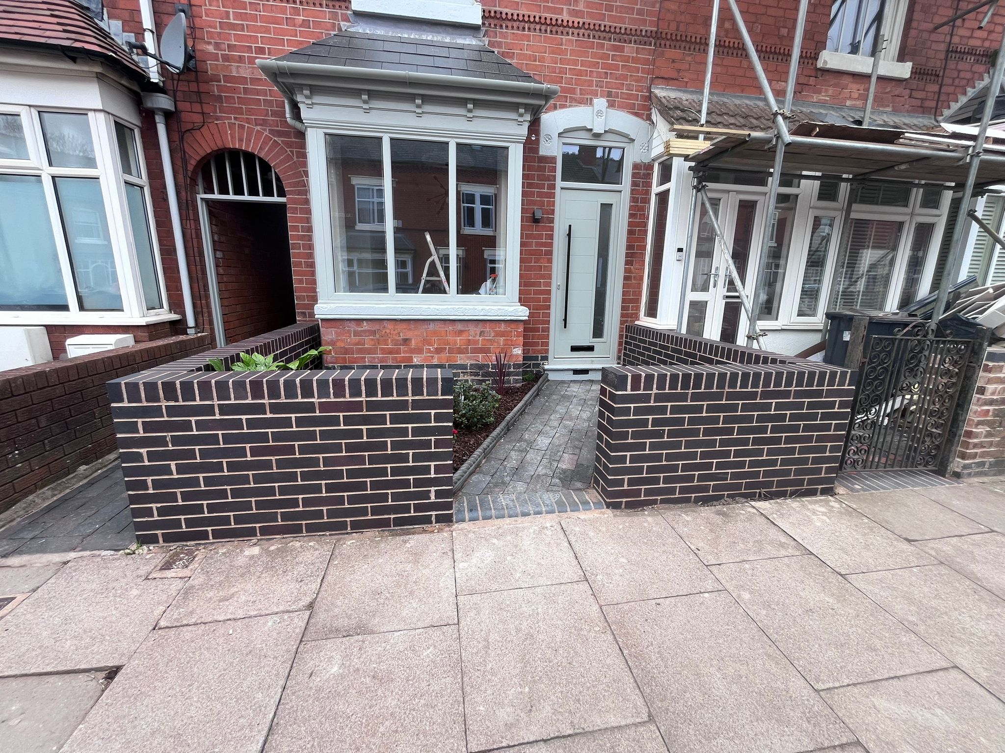 Terrace front garden with new brick wall